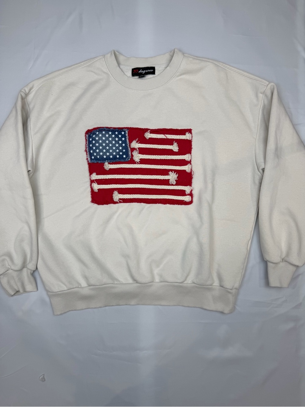 33 Degrees Cream Crewneck Sweatshirt with Distressed American Flag Patch